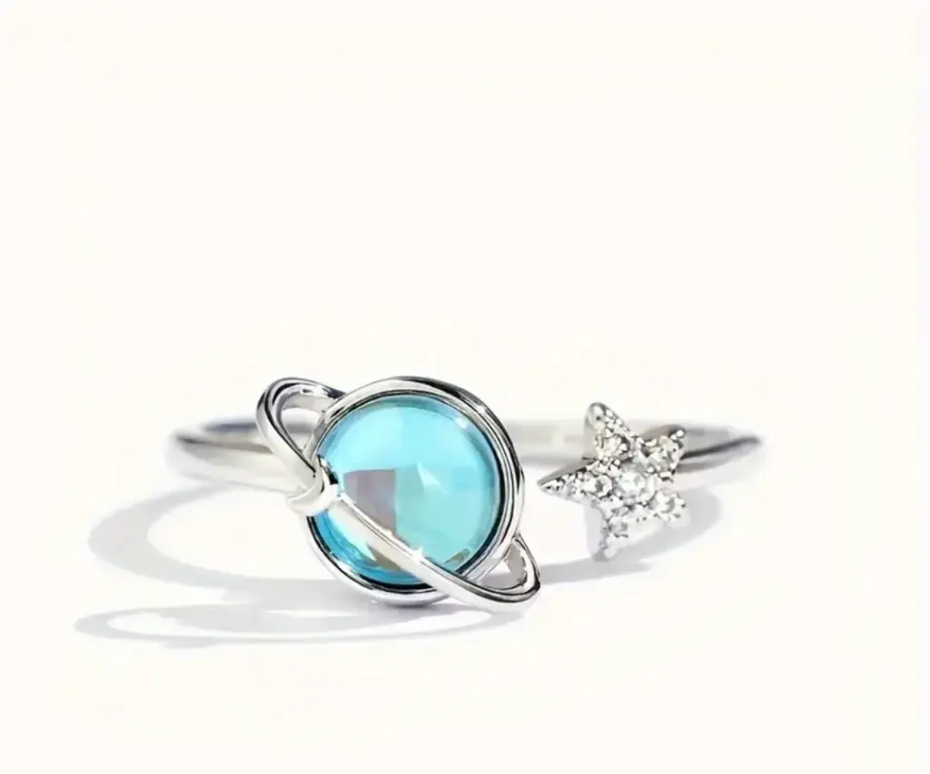 Unazë me dizajn ylli dhe planeti