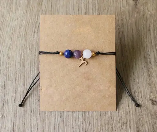 Byzylyk me miks gurësh natyralë dhe simbol të shenjave të zodiakut